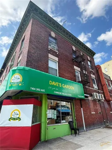 a sign that is on the side of a building