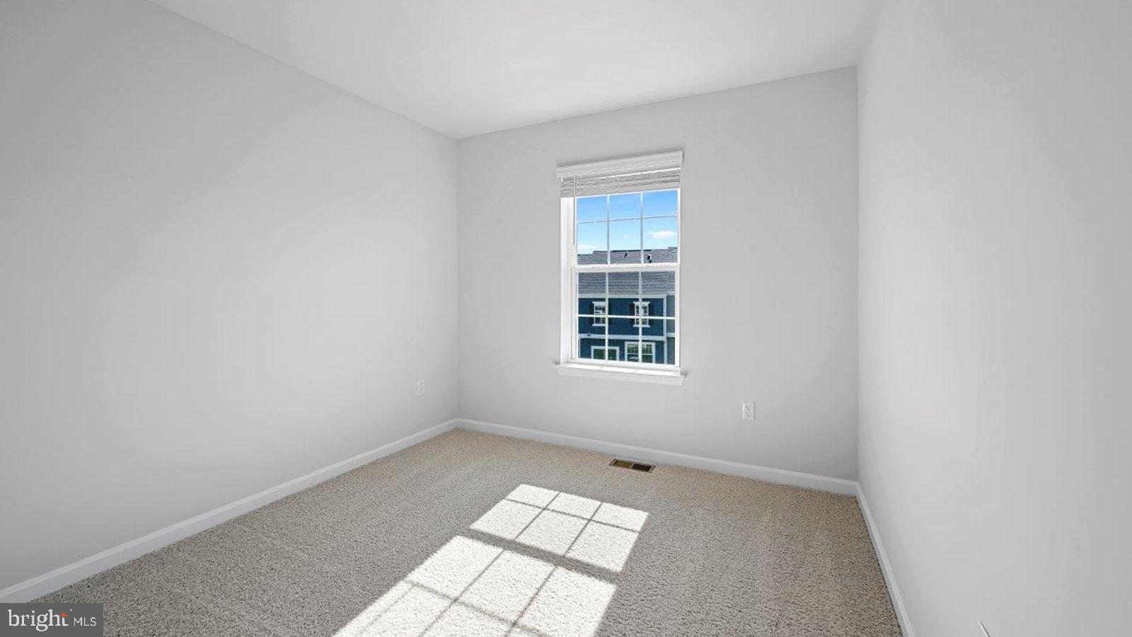 5046 Silver Oak Drive Rosedale, MD 21237 - Photo 15 of 21 an empty room with windows