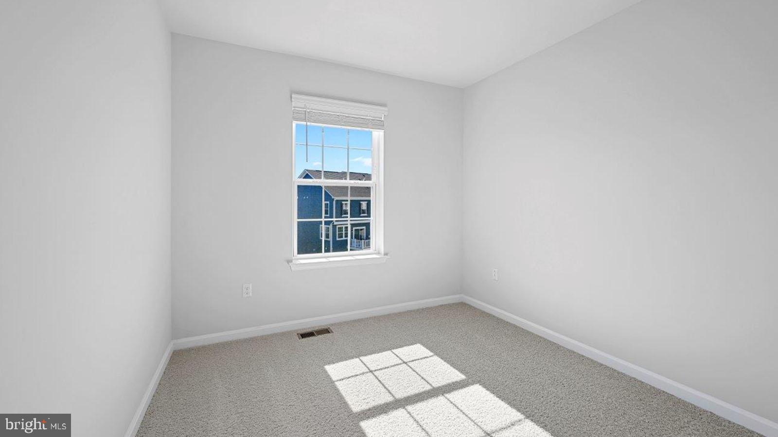 5046 Silver Oak Drive Rosedale, MD 21237 - Photo 16 of 21 an empty room with windows