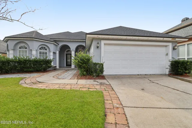 a view of entrance gate of a house