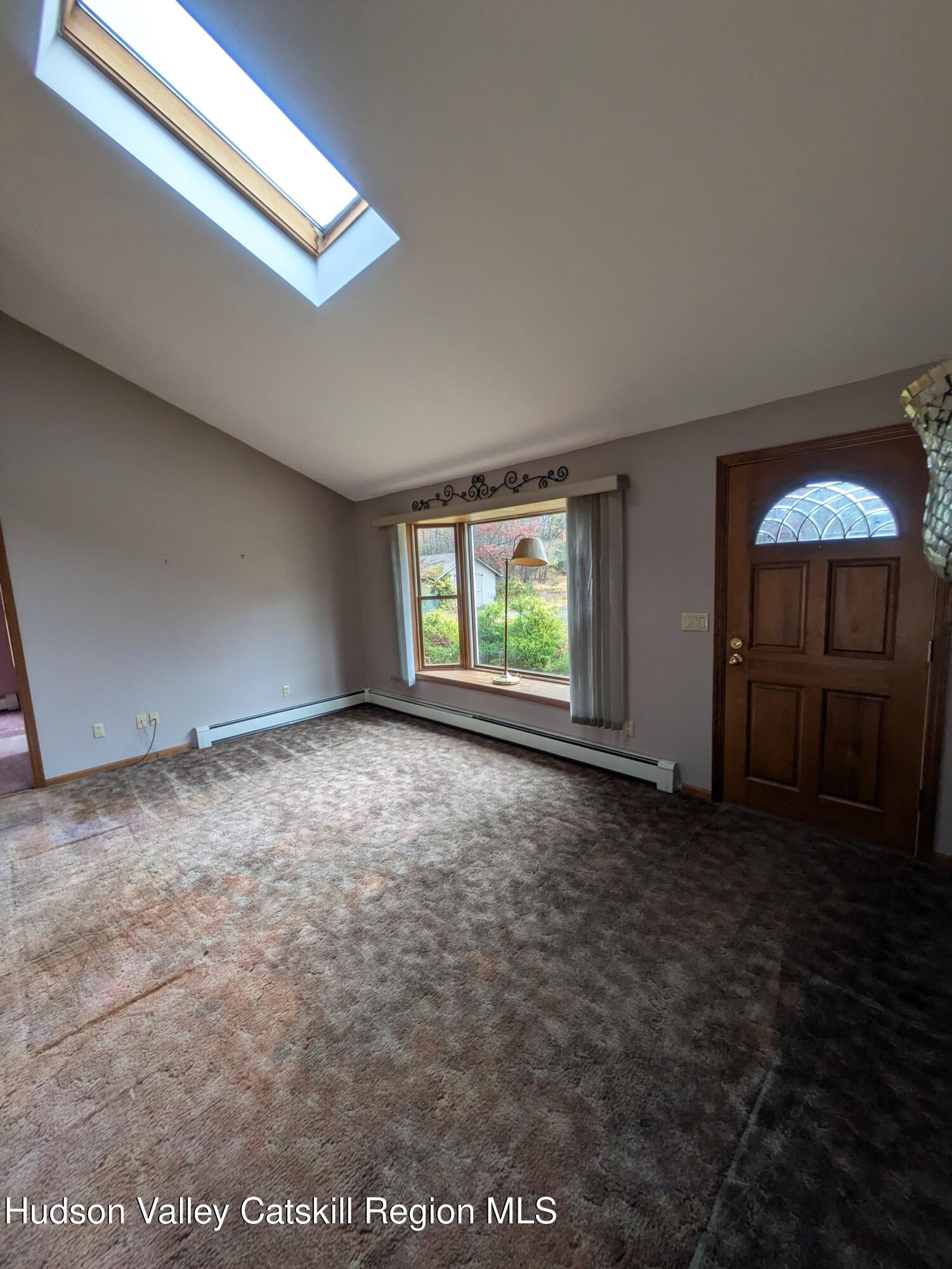 15 Valk Road Saugerties, NY 12477 - Photo 15 of 35 a view of an empty room with a window