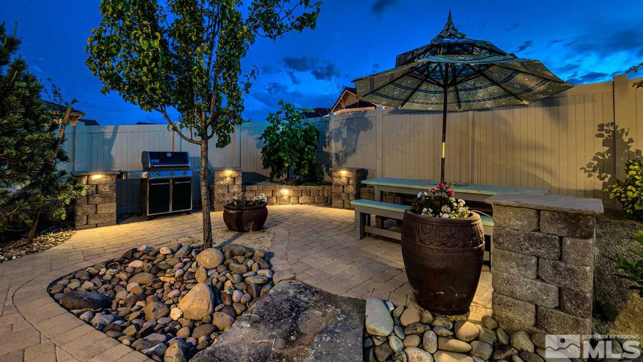 9645 Abigail Way Reno, NV 89521 - Photo 23 of 25 a front view of a house with a yard
