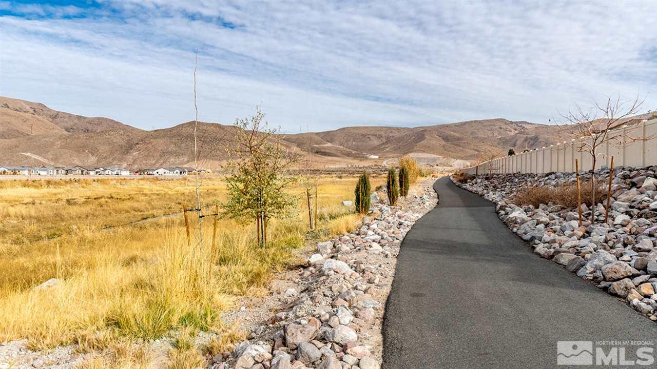 9645 Abigail Way Reno, NV 89521 - Photo 3 of 25 a view of a pathway with a mountain in the background