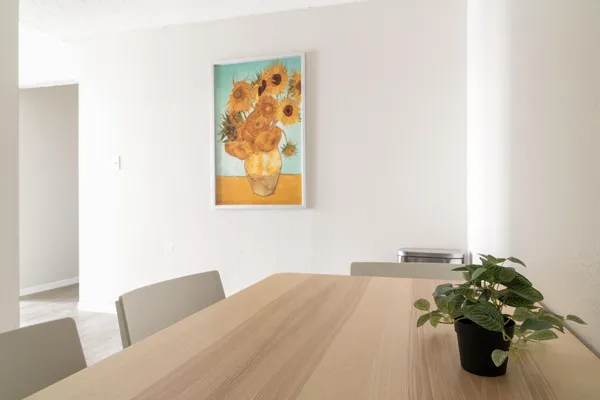 a bedroom with a bed and a couch