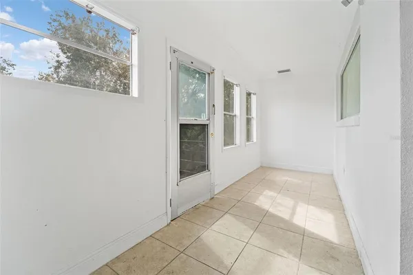 a view of an empty room with window