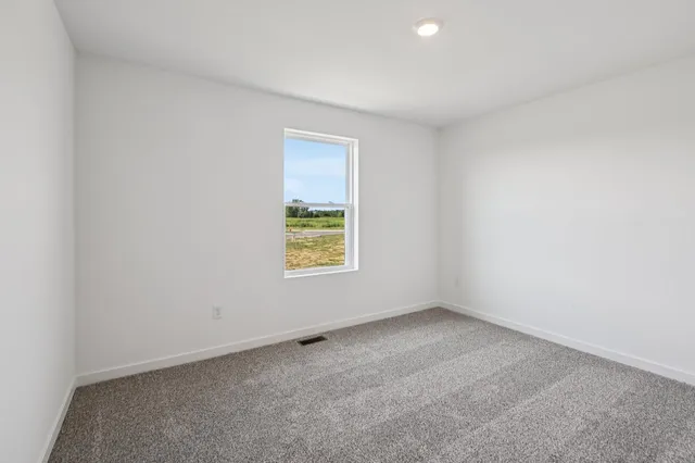 an empty room with a window