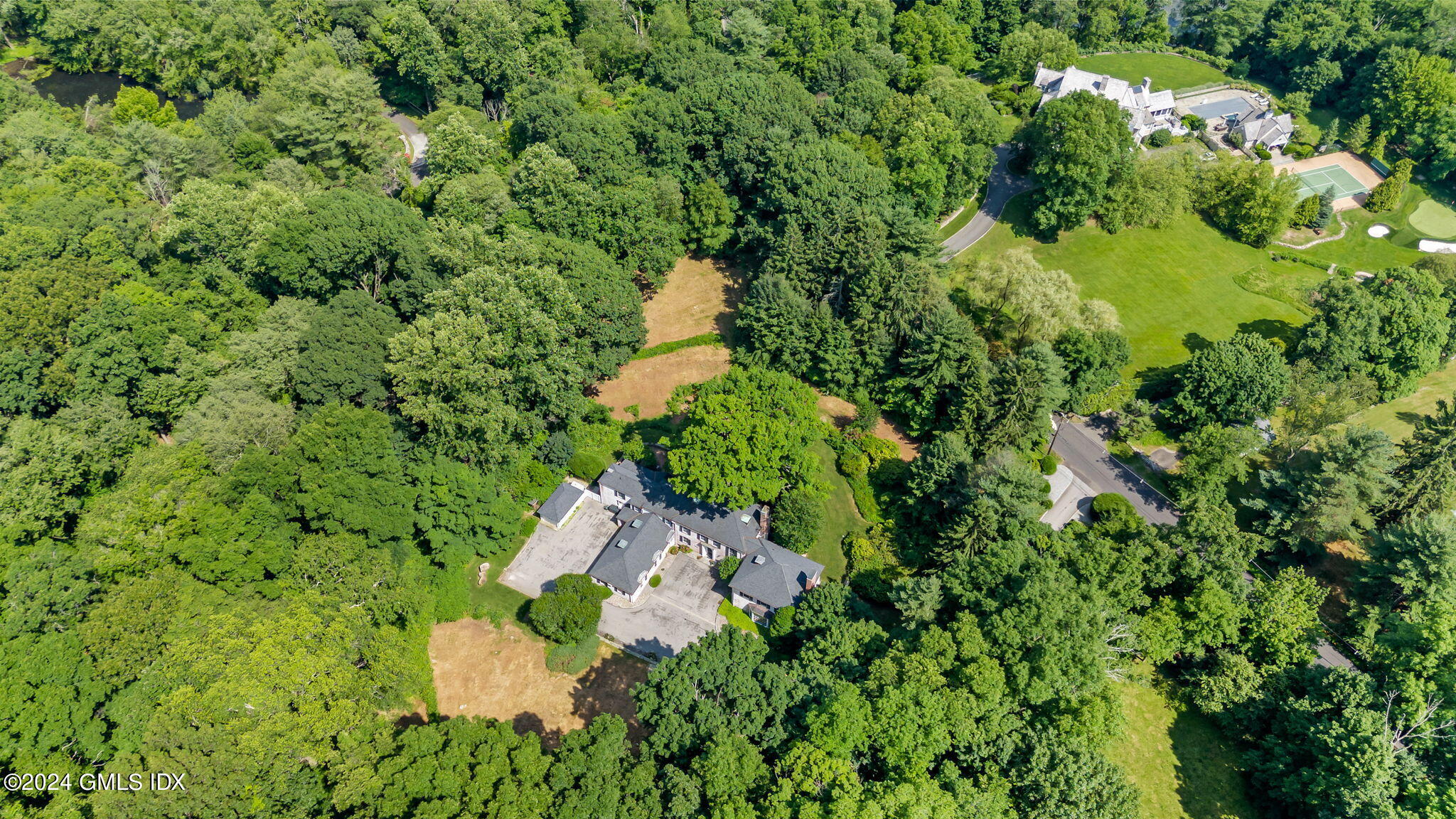 0 Highland Farm Road Greenwich, CT 06831 - Photo 3 of 7 an aerial view of a house with a yard