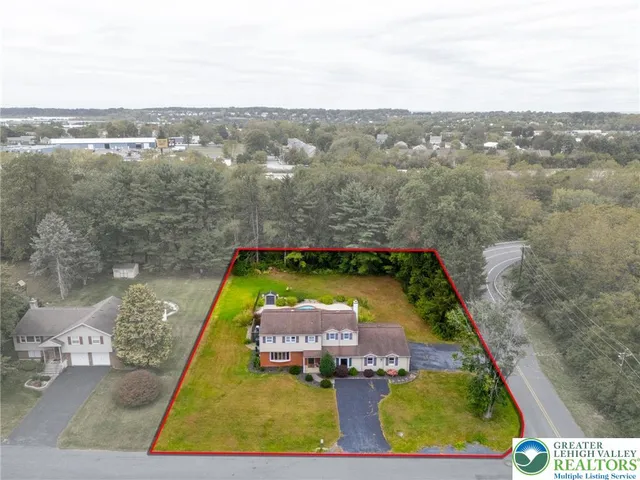 a view of swimming pool with a yard