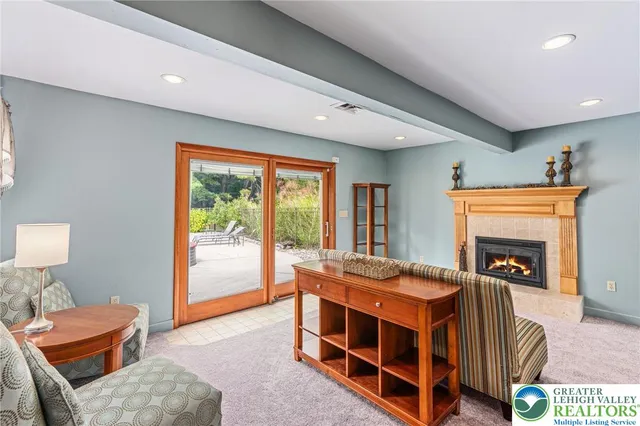 a room with furniture and a fireplace