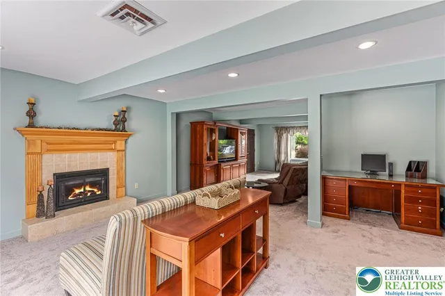 a open kitchen with stainless steel appliances granite countertop a stove and a refrigerator