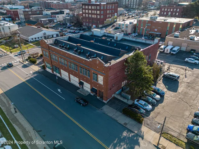 a bathroom with a toilet a sink and bathtub