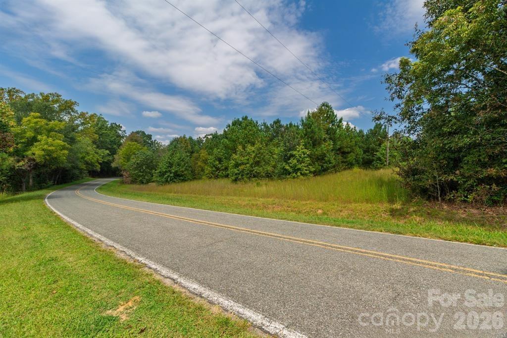 0 Putnam Lake Road Kings Mountain, NC 28086 - Photo 5 of 7 a view of a lake with a big yard