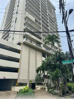 a front view of a building with street view