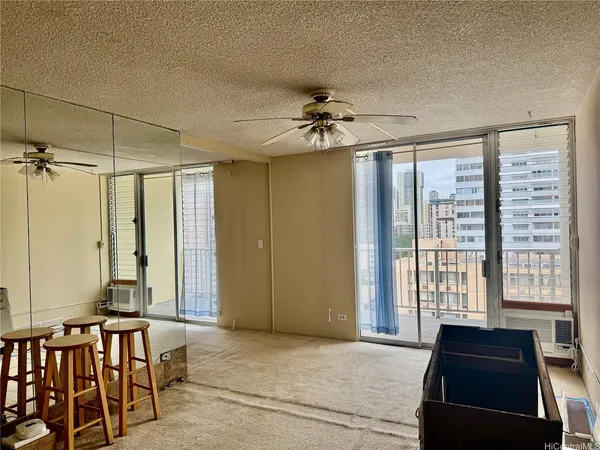 a view of a livingroom with furniture