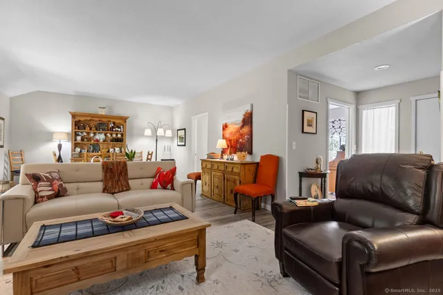 a living room with furniture and a couch