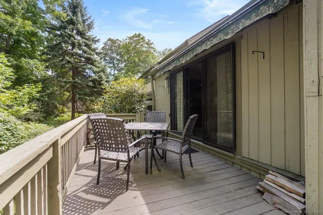 a view of balcony with furniture