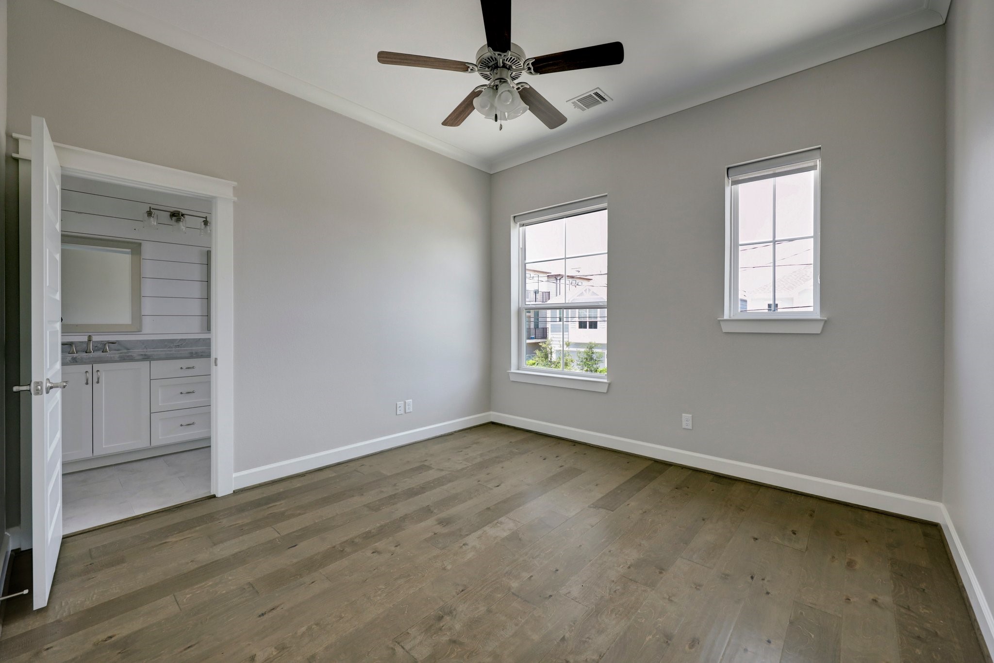 5233 Larkin Street, Unit A Houston, TX 77007 - Photo 15 of 15 wooden floor in an empty room with a window