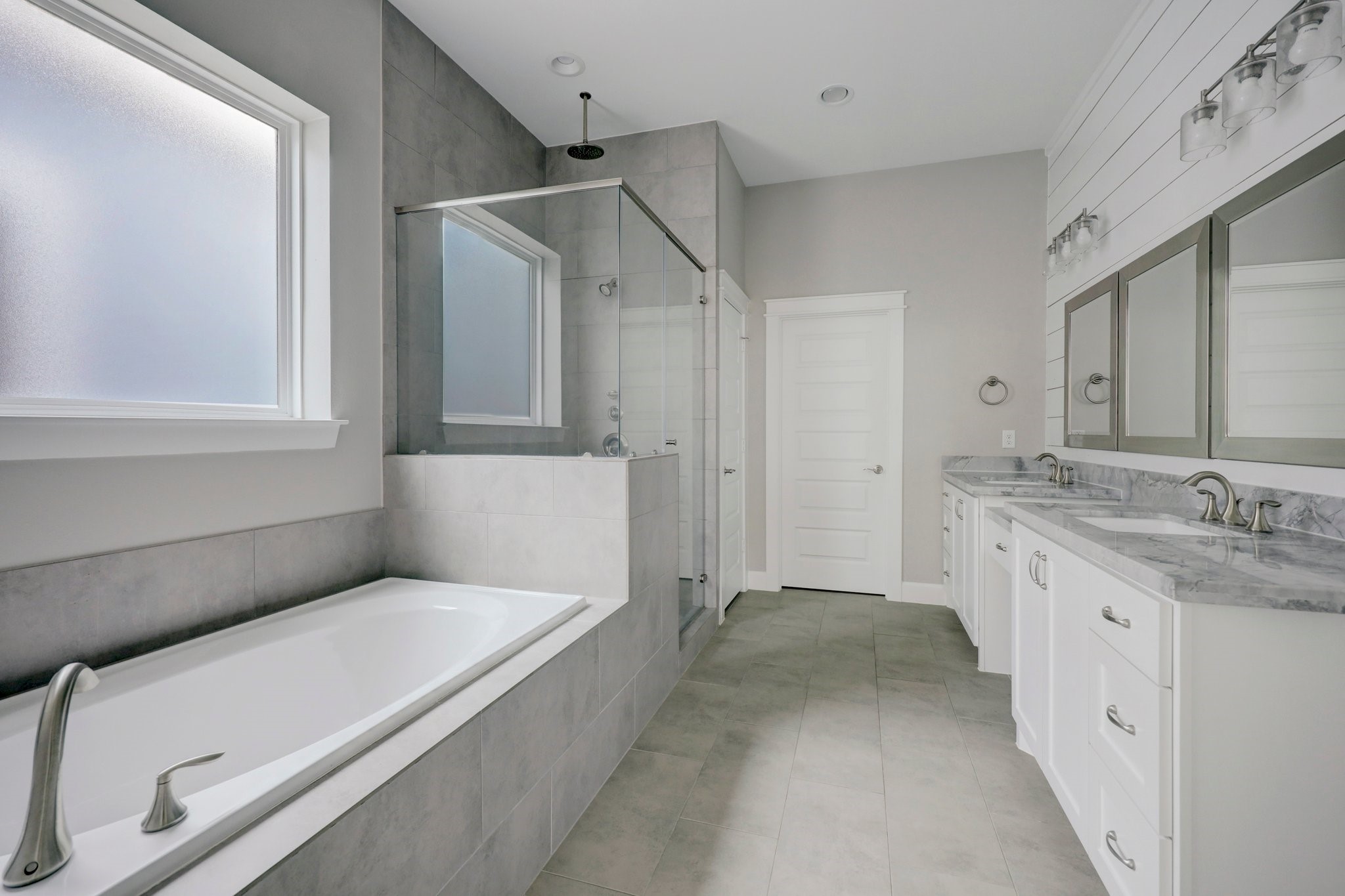 5233 Larkin Street, Unit A Houston, TX 77007 - Photo 8 of 15 a bathroom with a granite countertop sink a toilet and shower