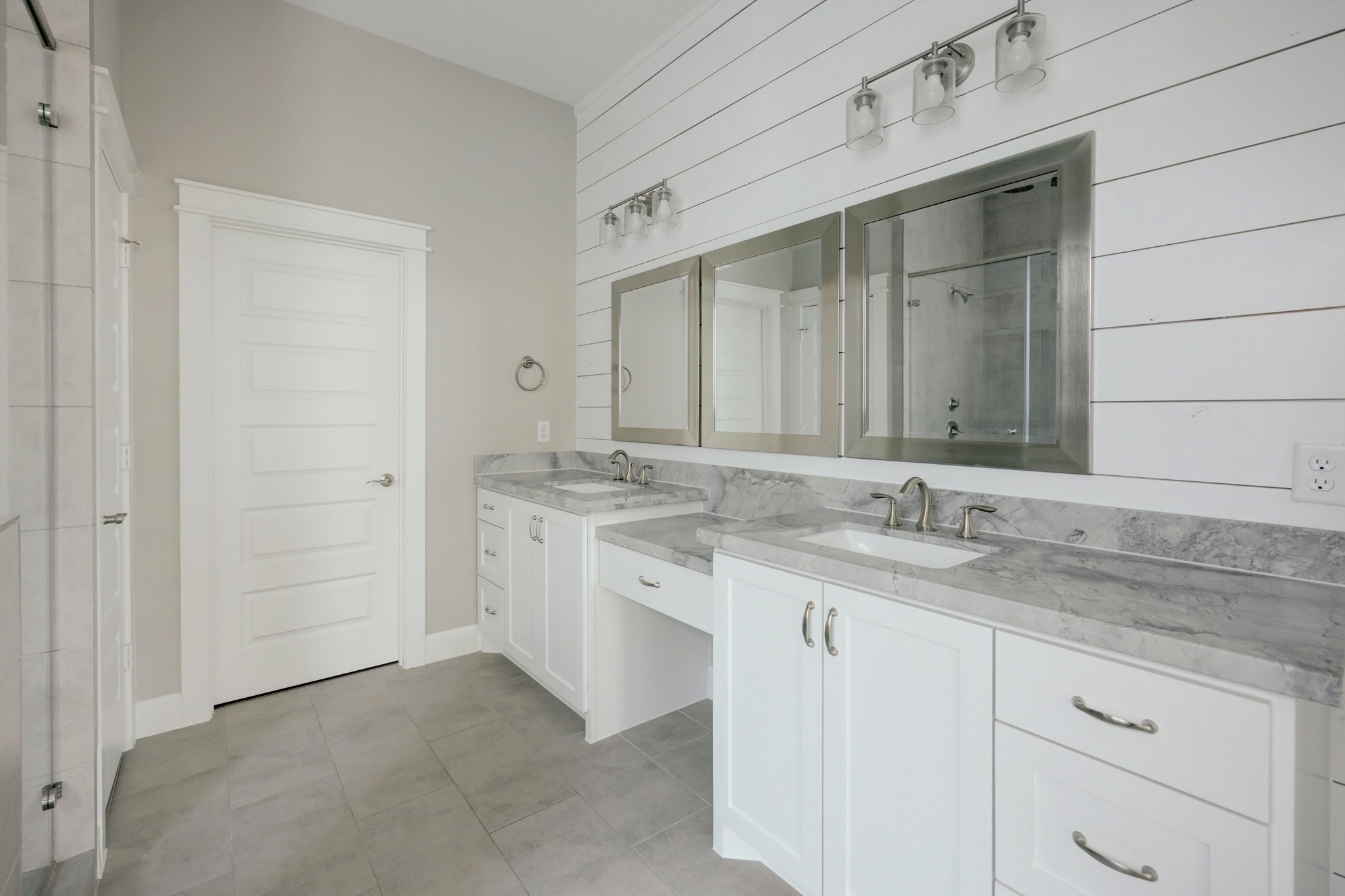 5233 Larkin Street, Unit A Houston, TX 77007 - Photo 9 of 15 a bathroom with a granite countertop sink and a mirror
