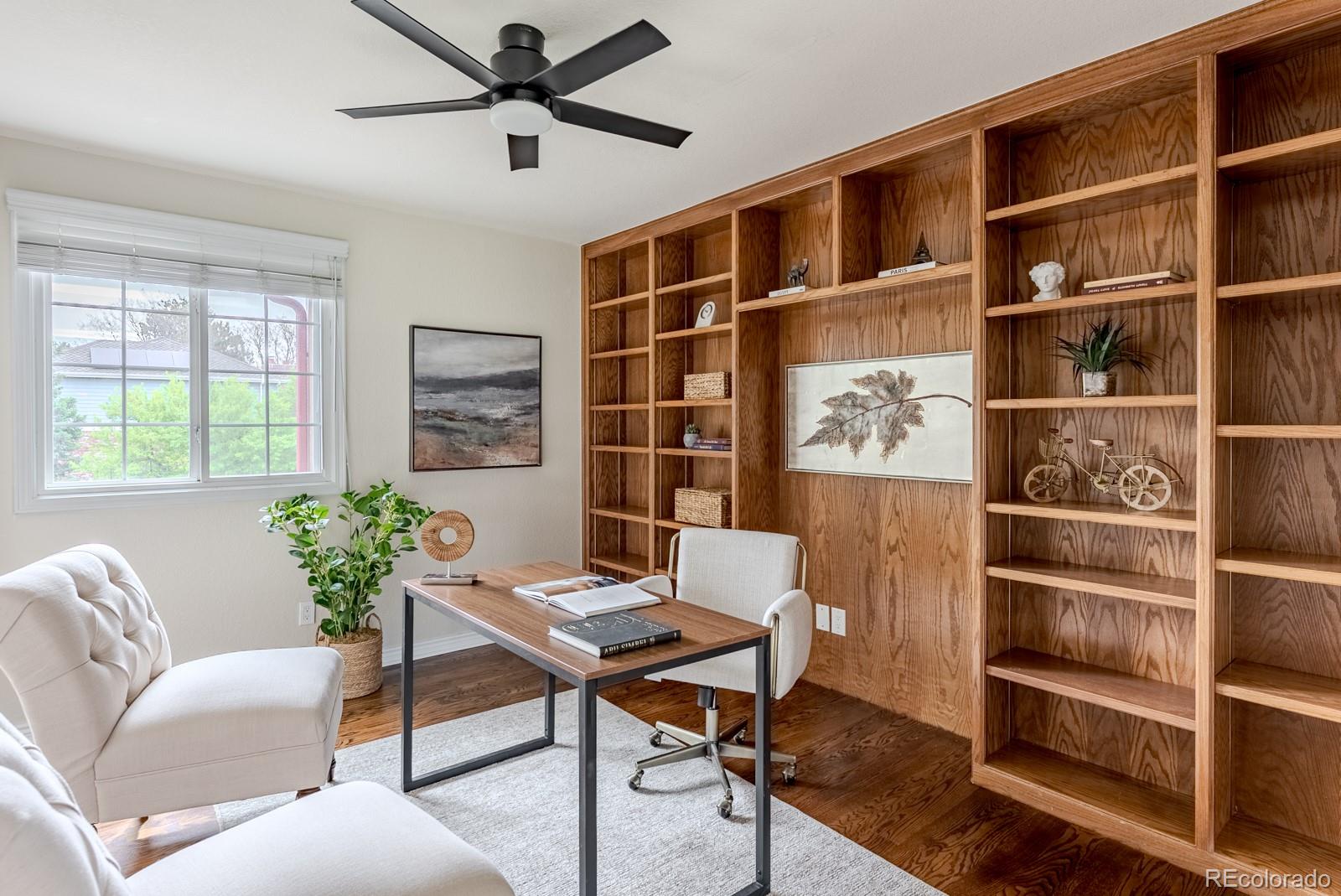 1914 Terrace Drive Highlands Ranch, CO 80126 - Photo 28 of 47 a workspace with a bookshelf