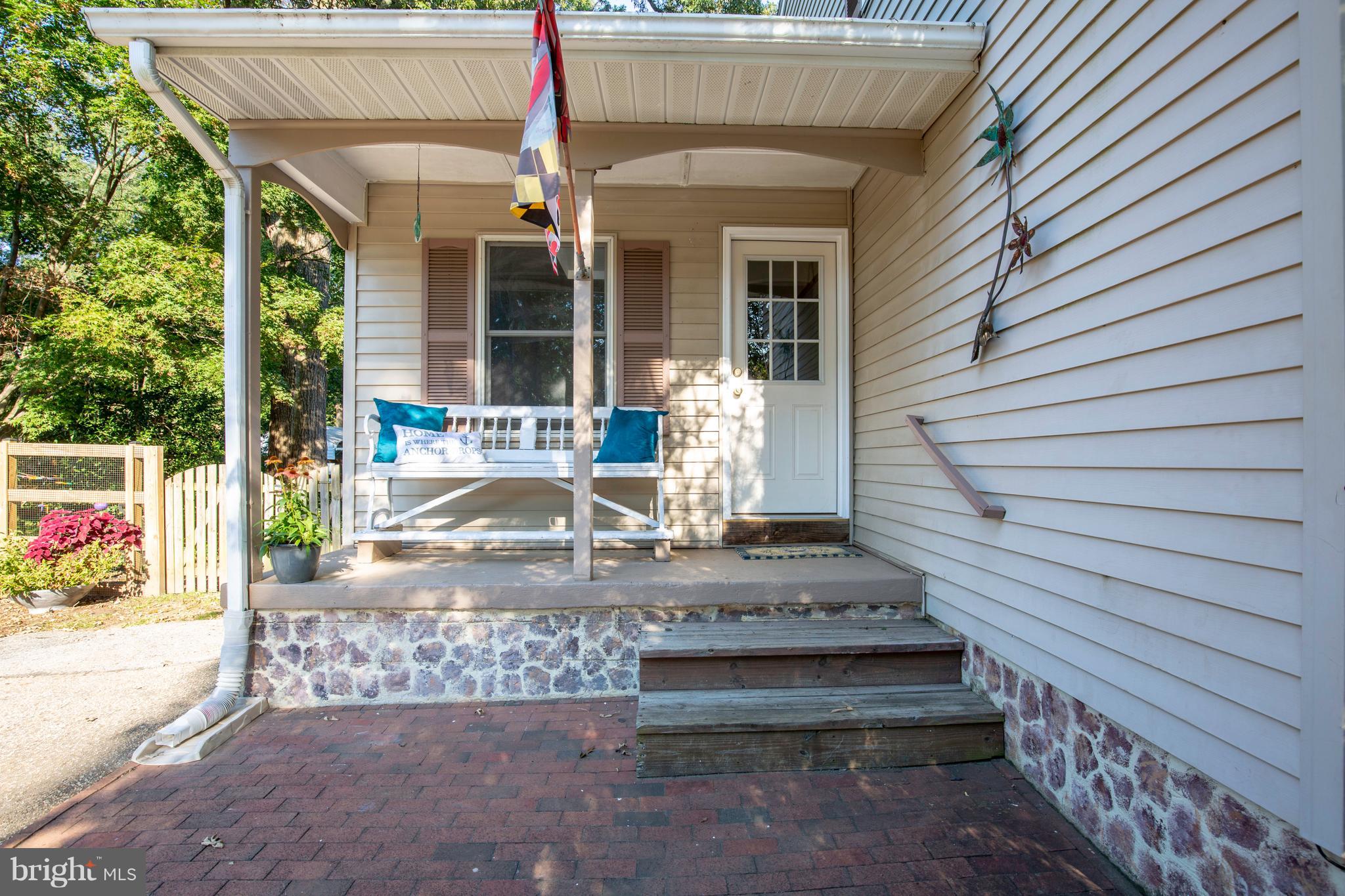 764 Dividing Road Severna Park, MD 21146 - Photo 3 of 49 Covered Porch With Entrance To Family Room