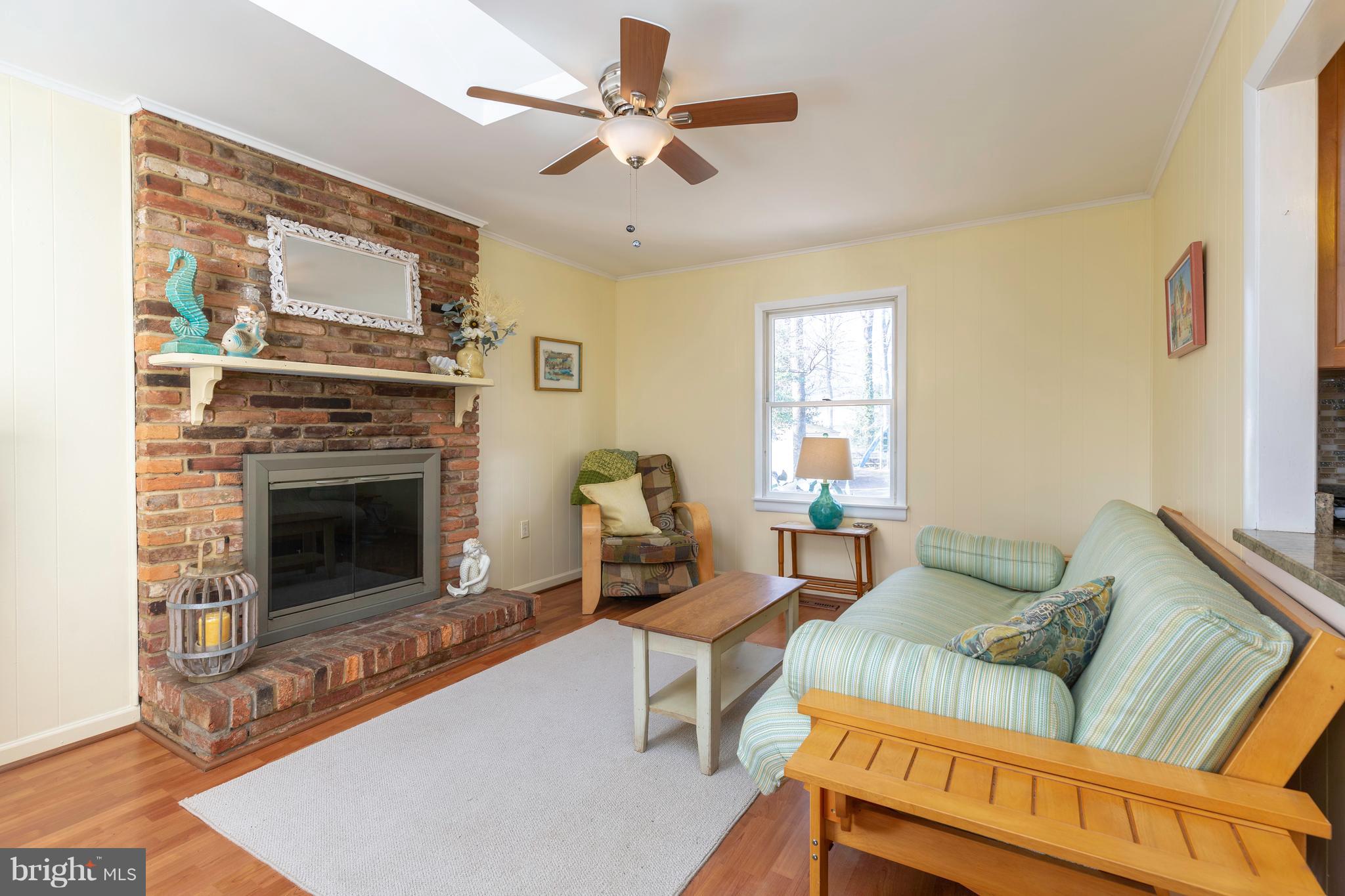 764 Dividing Road Severna Park, MD 21146 - Photo 22 of 49 And Cozy Wood Burning Fireplace With Brick Hearth