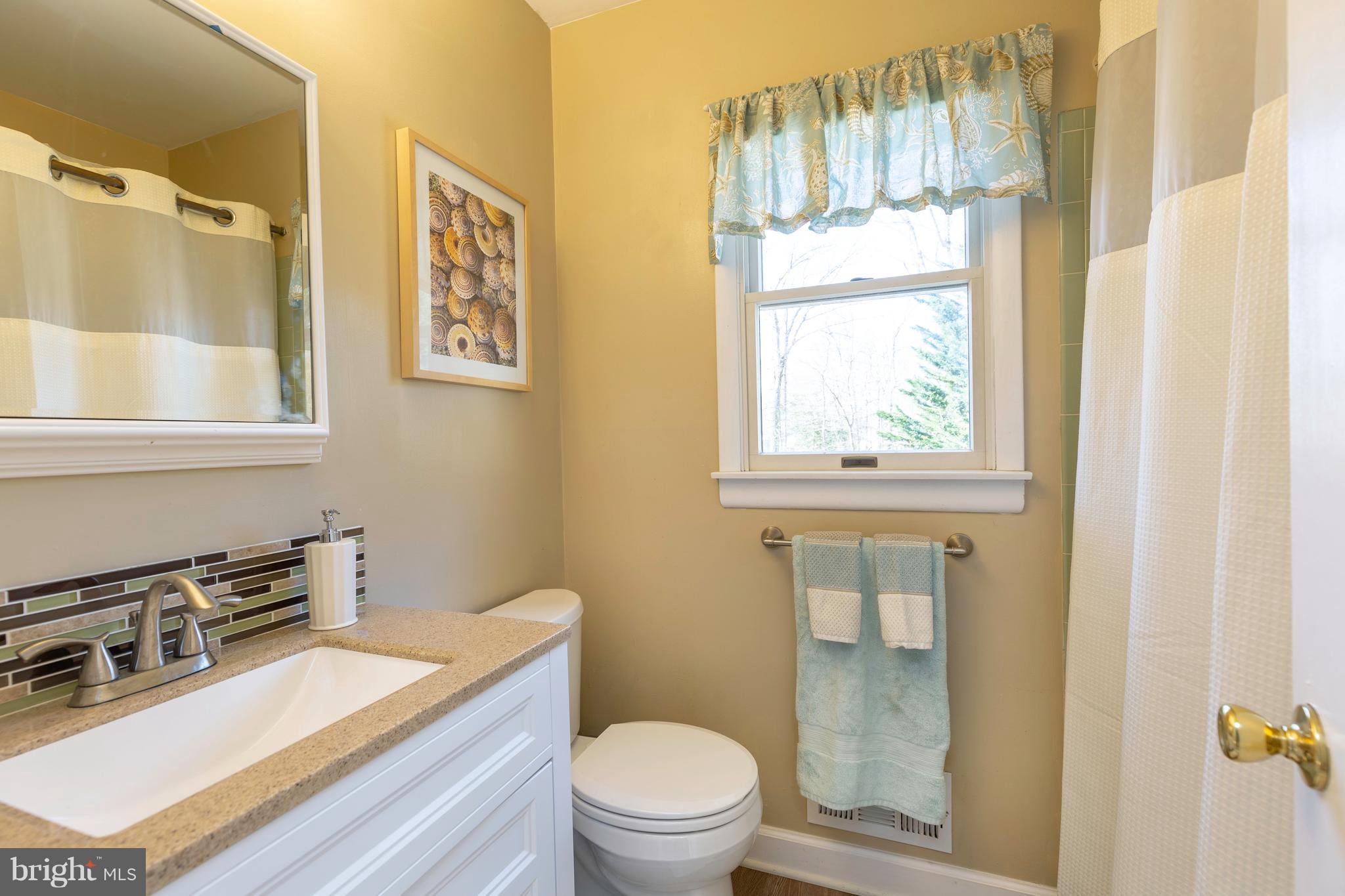 764 Dividing Road Severna Park, MD 21146 - Photo 28 of 49 Upper Level Hall Bath Updated In 2018