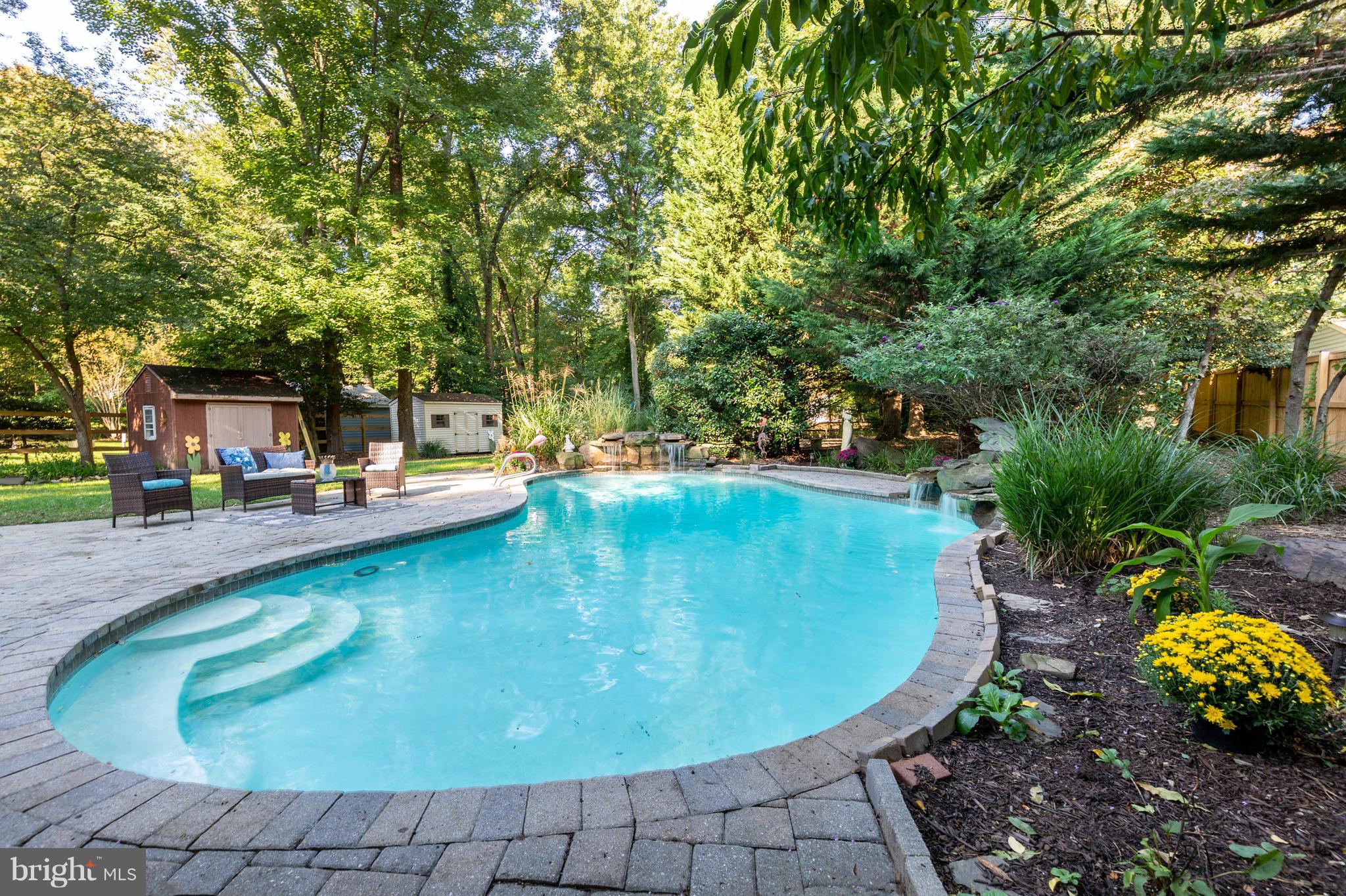 764 Dividing Road Severna Park, MD 21146 - Photo 5 of 49 Custom Built-In Pool With Water Fall Feature
