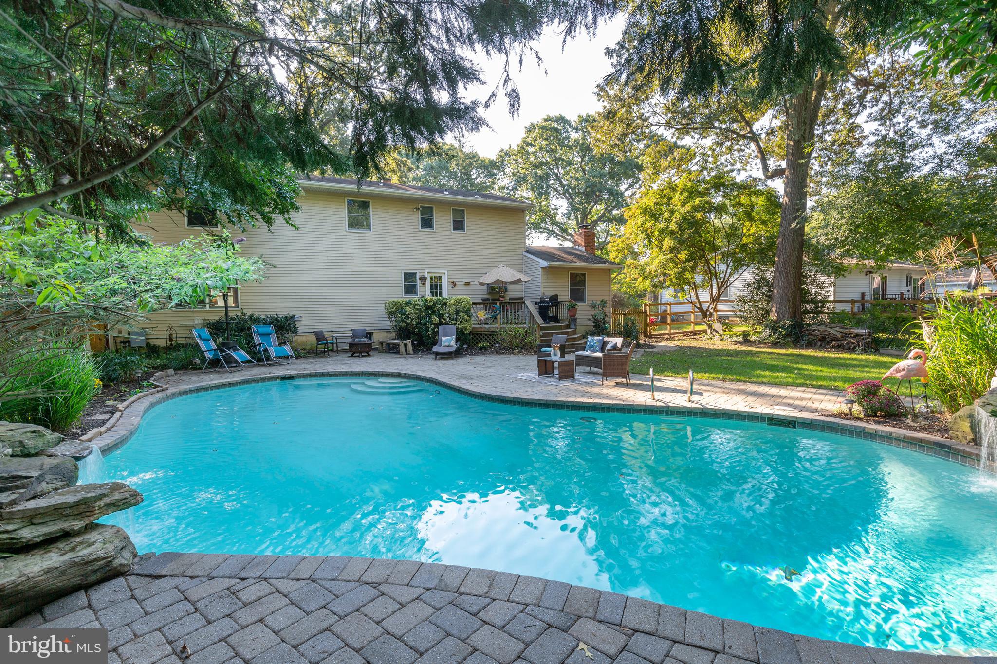 764 Dividing Road Severna Park, MD 21146 - Photo 6 of 49 Surrounded By Paver Patio And Landscaped Grounds