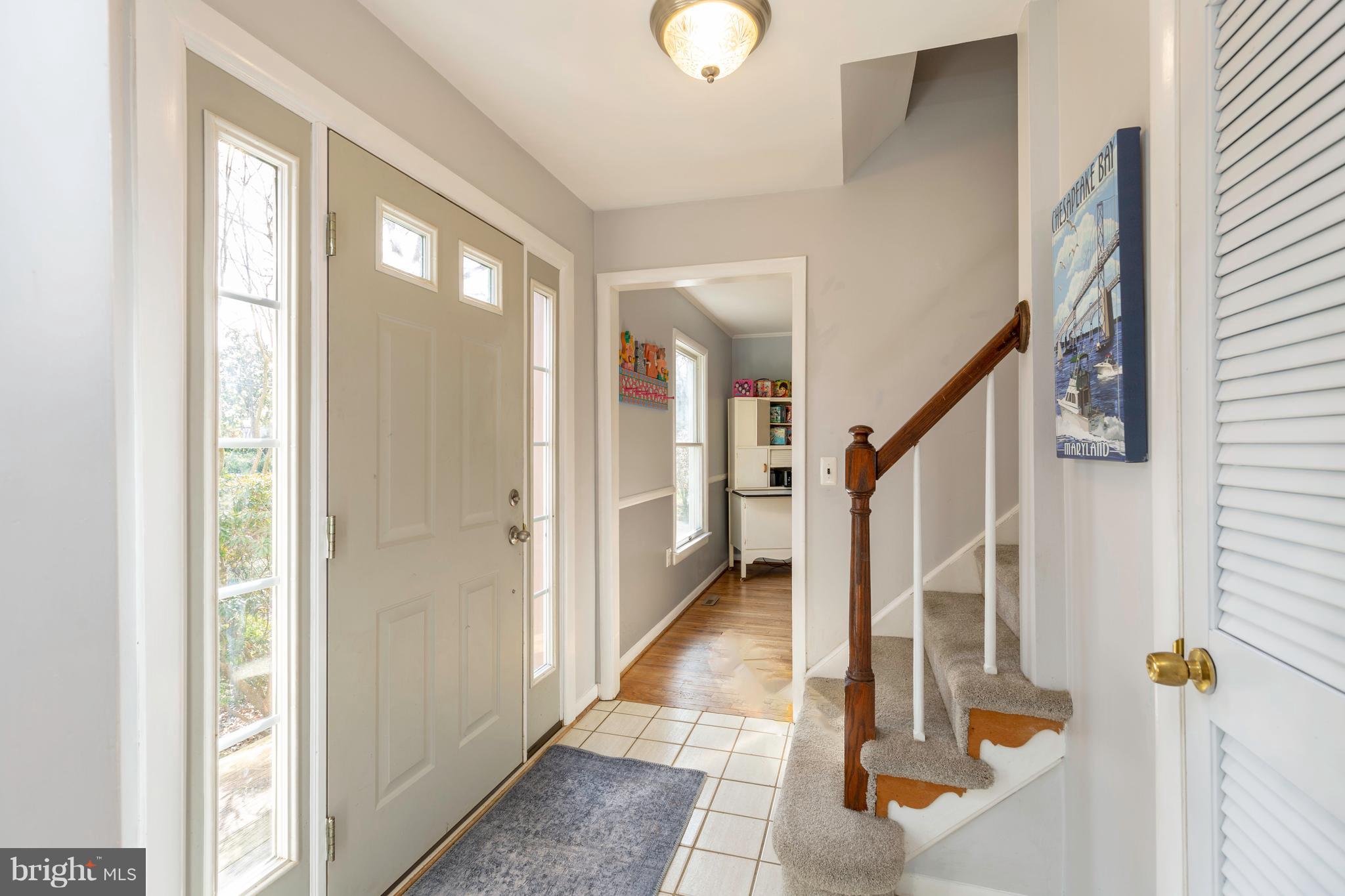 764 Dividing Road Severna Park, MD 21146 - Photo 7 of 49 Sunny Foyer With Coat Closet Welcomes As You Enter