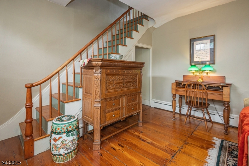 449 Stamets Road Milford, NJ 08848 - Photo 9 of 44 a view of an entryway with wooden floor and windows