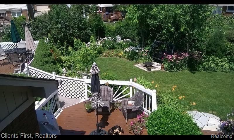46823 Doubletree Road Canton, MI 48187 - Photo 72 of 74 DECK/YARD SUMMER VIEW