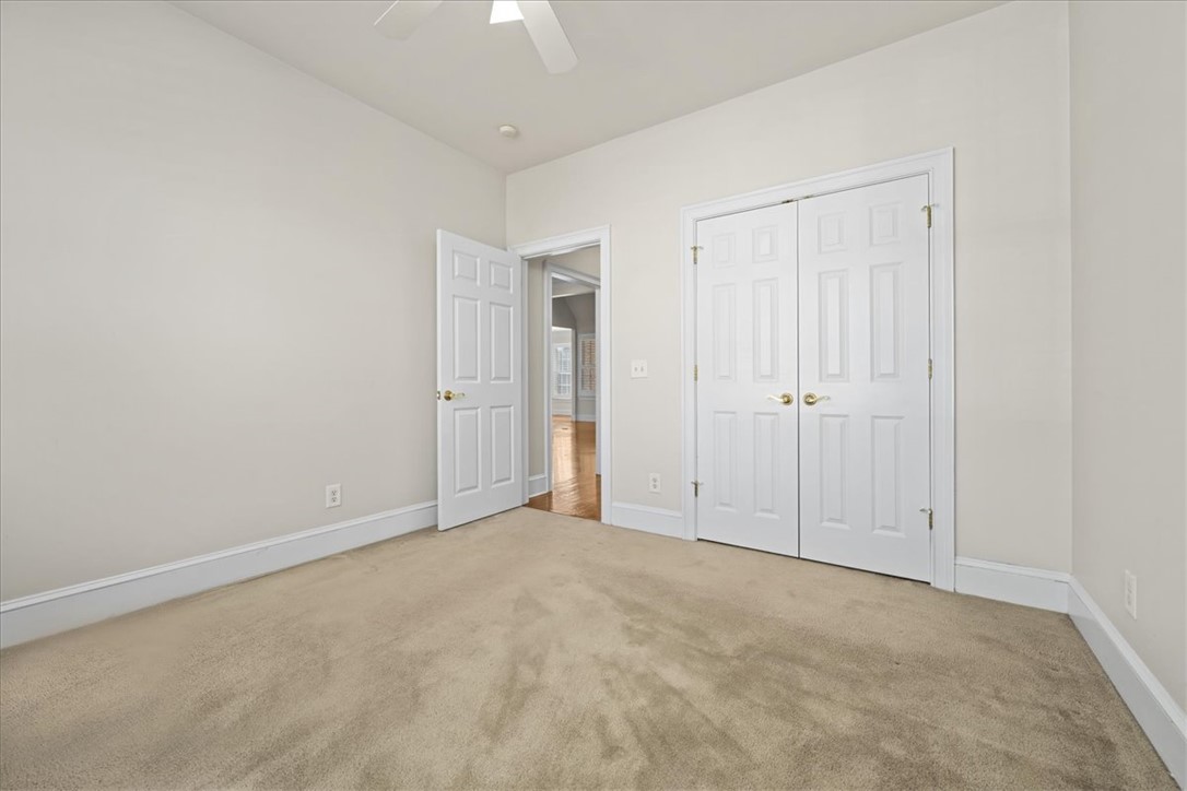 38 Angus Run Seneca, SC 29672 - Photo 19 of 46 This spacious room features neutral tones and ample natural light, ideal for relaxation.