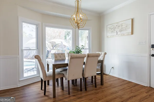 a bathroom with a bathtub and a sink