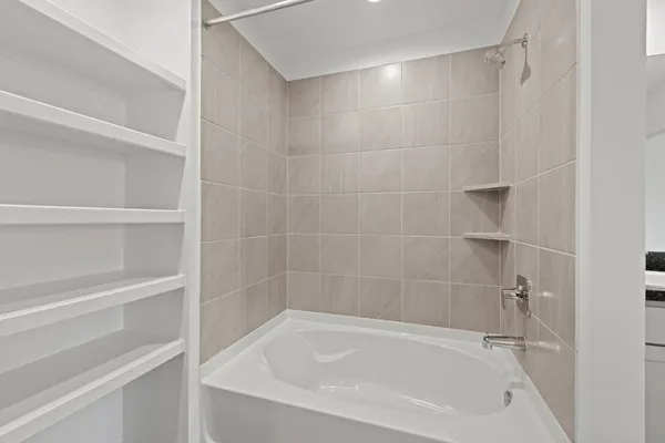 a close up of a bathtub in a bathroom