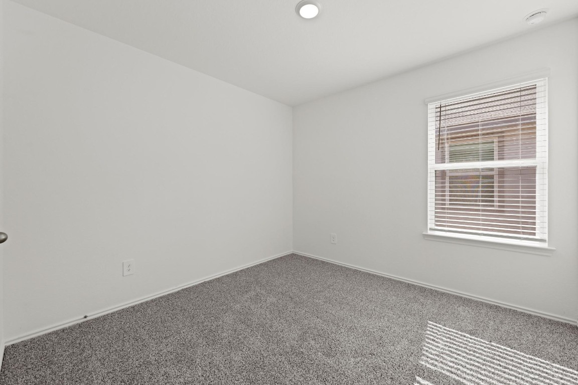 5710 Sycamore Glen Dr Spring Spring, TX 77373 - Photo 16 of 18 a view of an empty room with a window