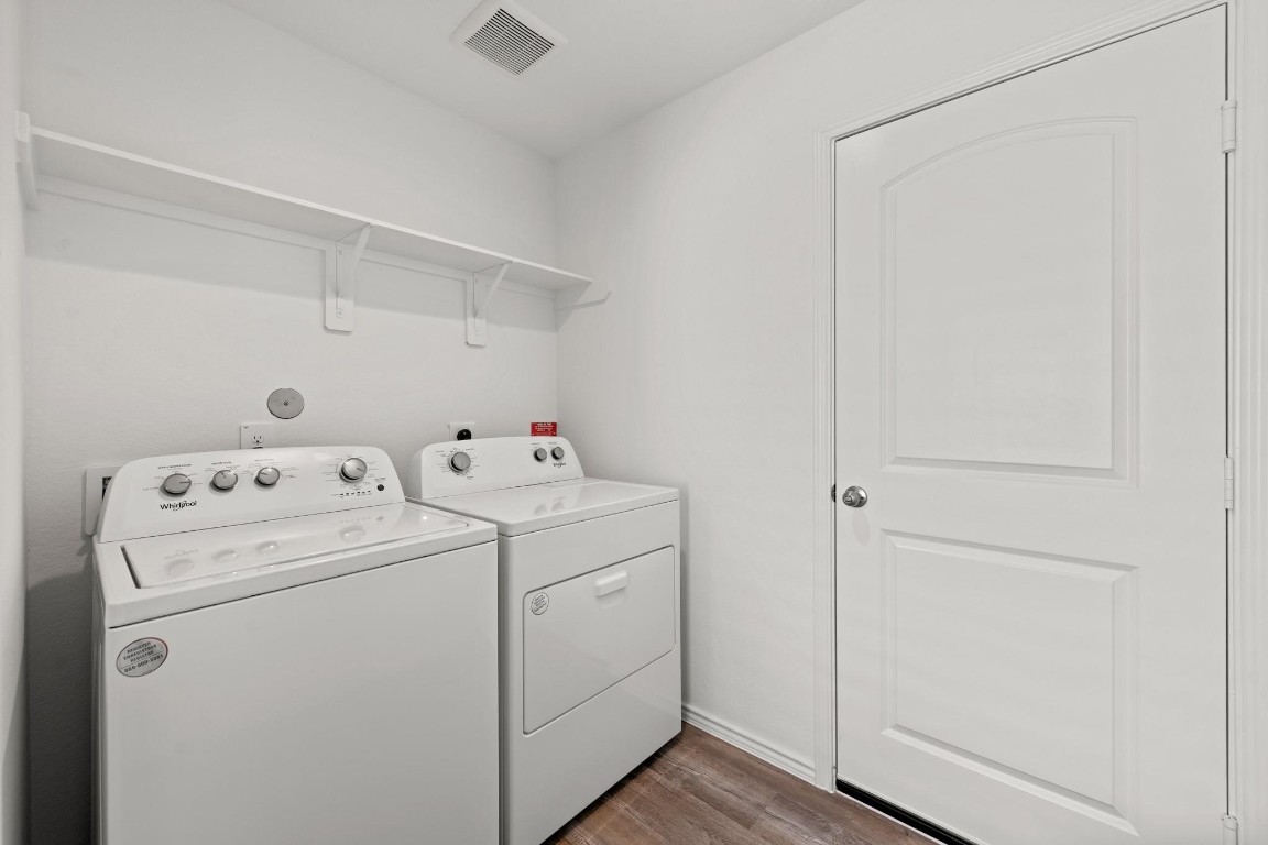 5710 Sycamore Glen Dr Spring Spring, TX 77373 - Photo 17 of 18 a view of storage and utility room with washer and dryer