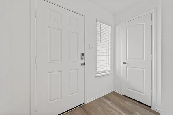 an empty room with windows