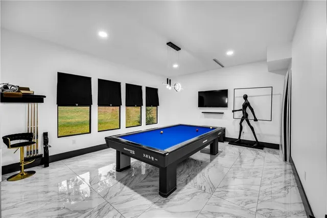 a room with pool table