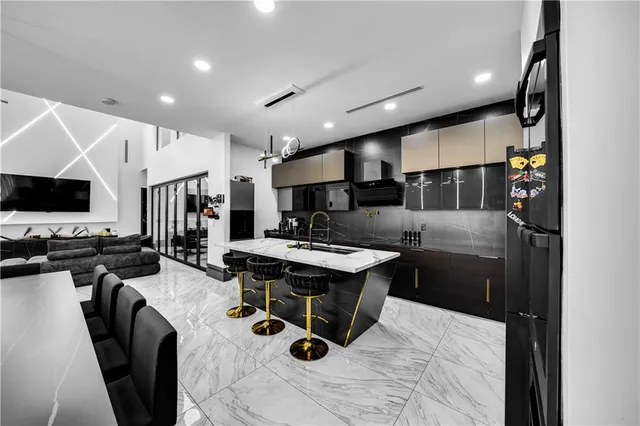 a kitchen with counter space cabinets and appliances