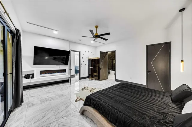 a bathroom with a bathtub and shower