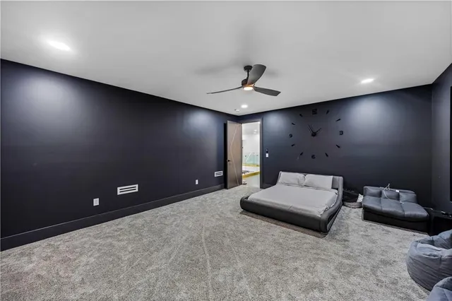 a living room with lots of furniture and a chandelier
