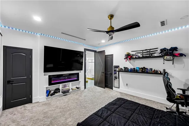 a view of a hallway with furniture and front door