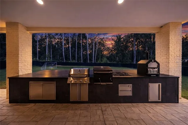 a view of a yard with a forest