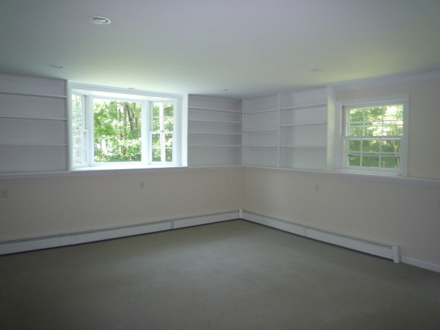 287 Briscoe Road New Canaan, CT 06840 - Photo 16 of 22 an empty room with a window