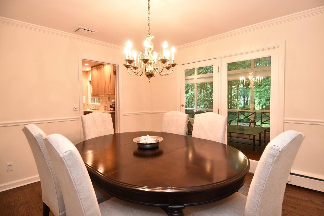 287 Briscoe Road New Canaan, CT 06840 - Photo 8 of 22 a view of a dining room with furniture window and outside view