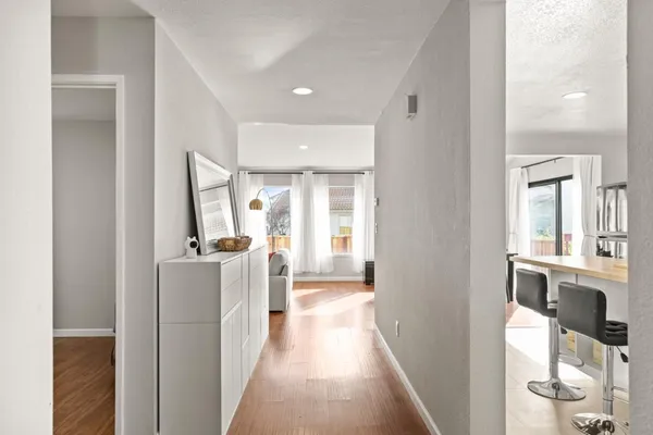 a view of a living room with a large window