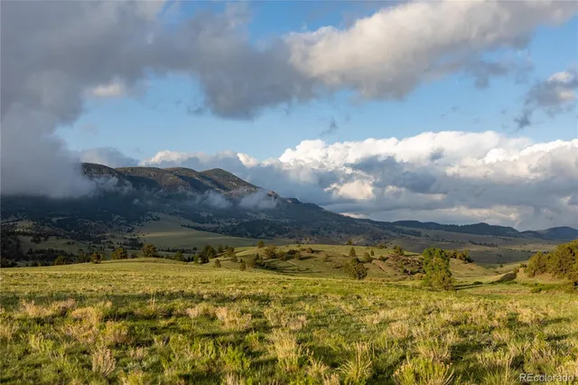 a view of lake with mountain