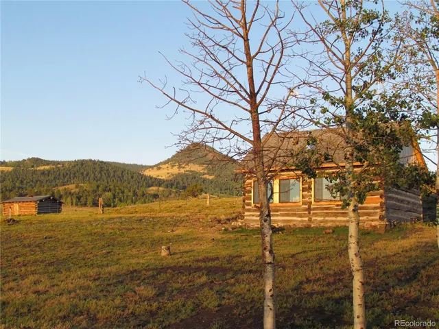 a view of an ocean with a mountain view