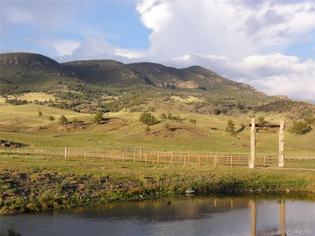 a view of ocean with mountains